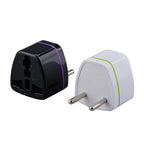 Black and white plug adapters on a white background