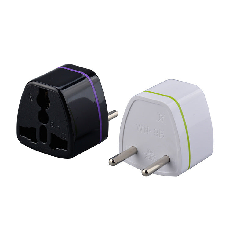 Black and white plug adapters on a white background
