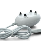 White electronic device with black knobs and a coiled cable on a white background