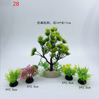 Set of small artificial plants with measurements on a white background