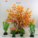Set of artificial aquarium plants with sizes indicated on a white background